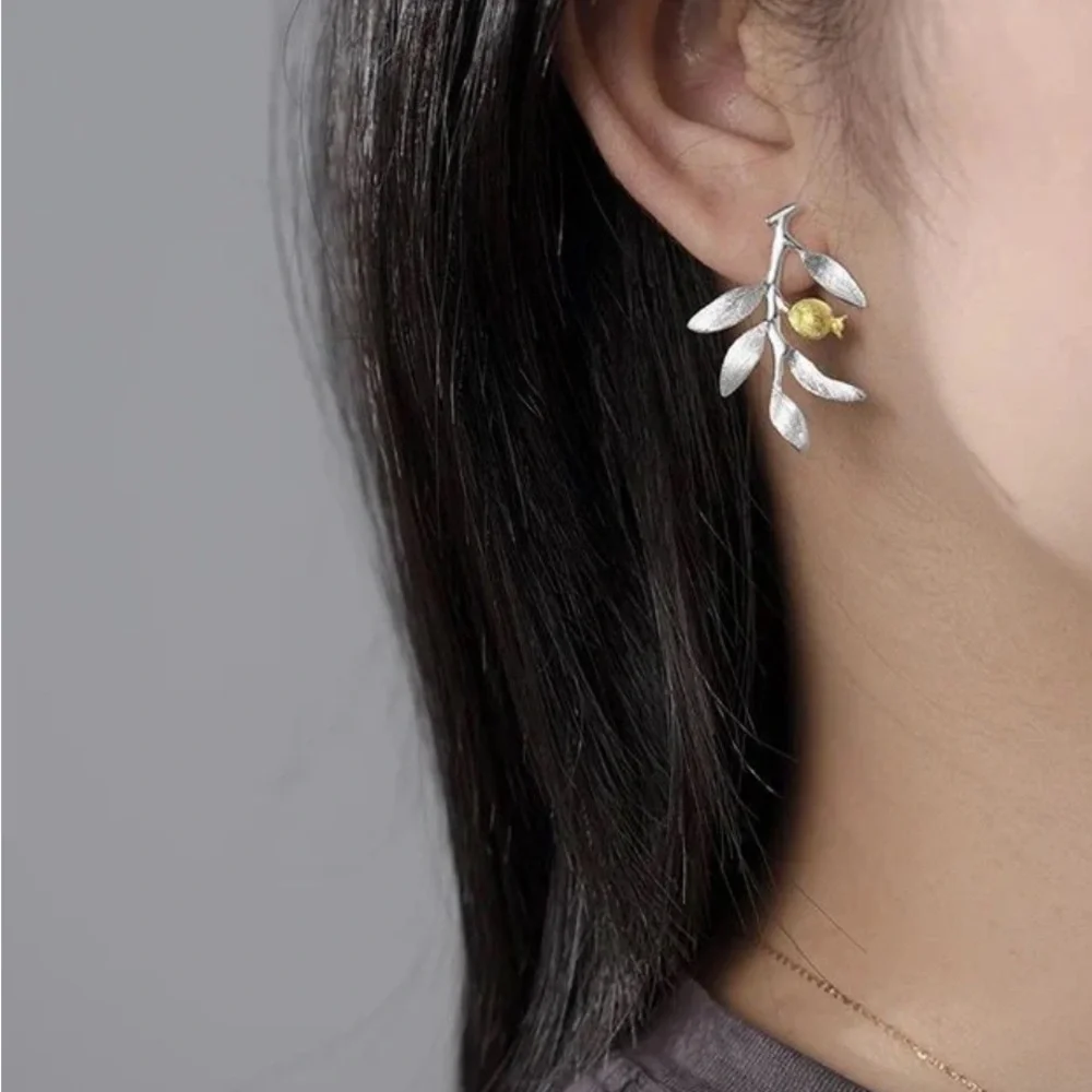 Elegant Silver and Gold Leaf Earrings - Picture 3 of 4